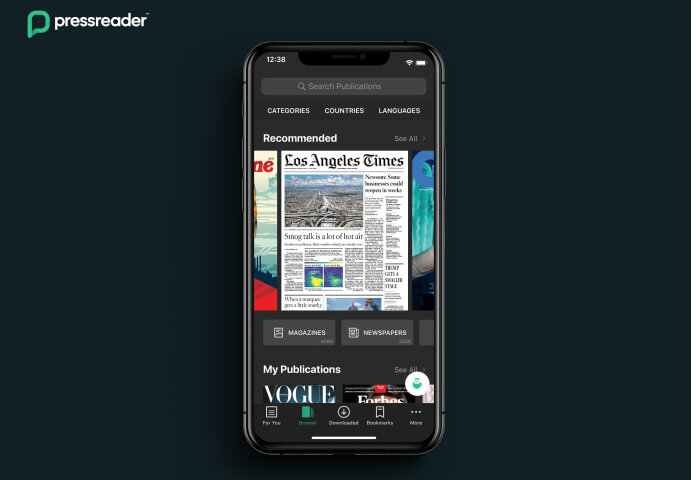 A single smarthphone showing a newspaper with PressReader