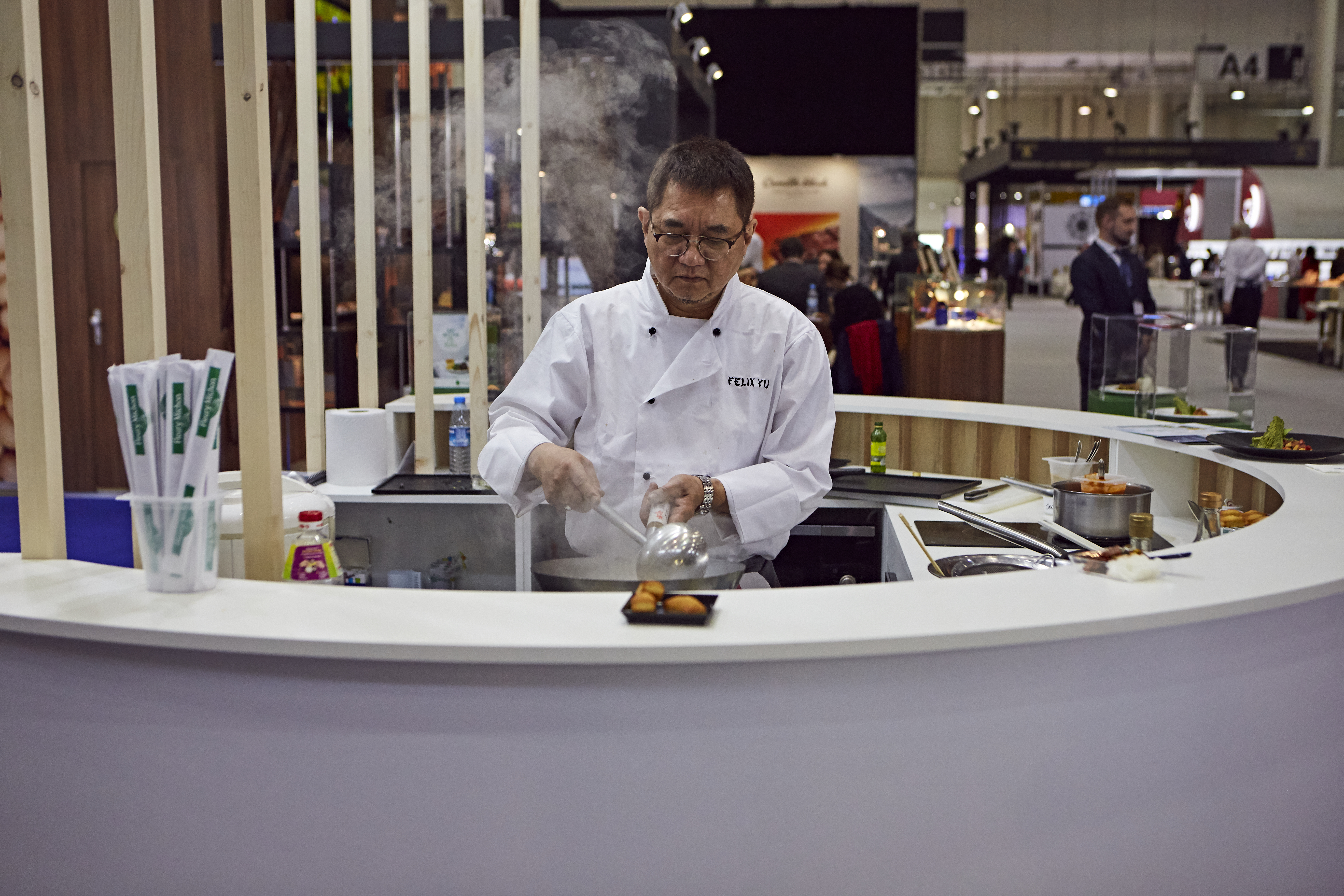 chef ladleling at taste of travel theatre