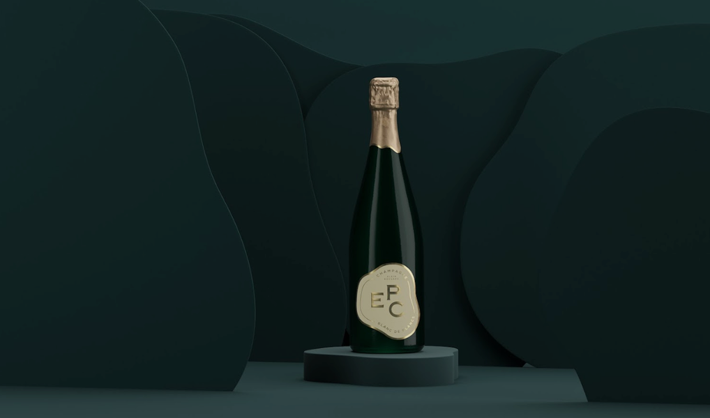 black gold-topped champagne bottle black background