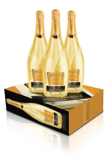 three gold champagne bottles on upturned box