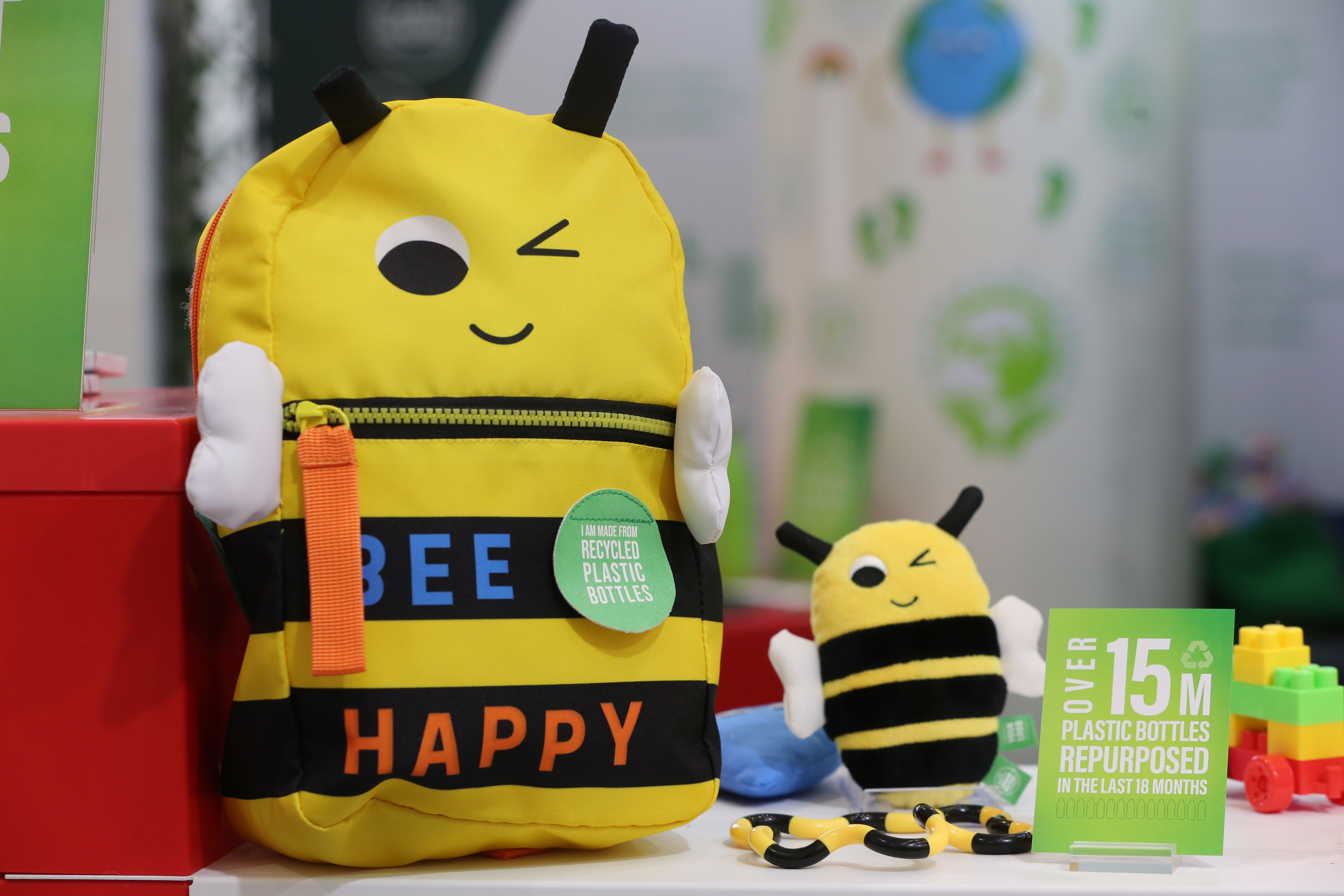 children's plush bee toy "bee happy" text